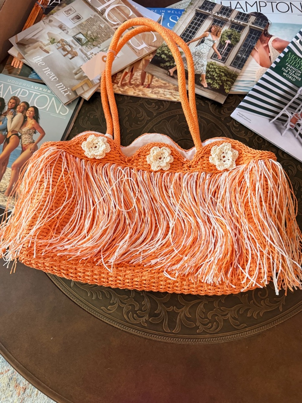 Vacation/Beach bag.
Orange Fringe Crochet Tote Bag with Floral Accents.